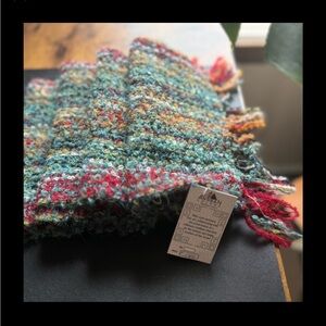 100% Baby Alpaca rainbow scarf. Soft, light and about 6ft+ of comfort.